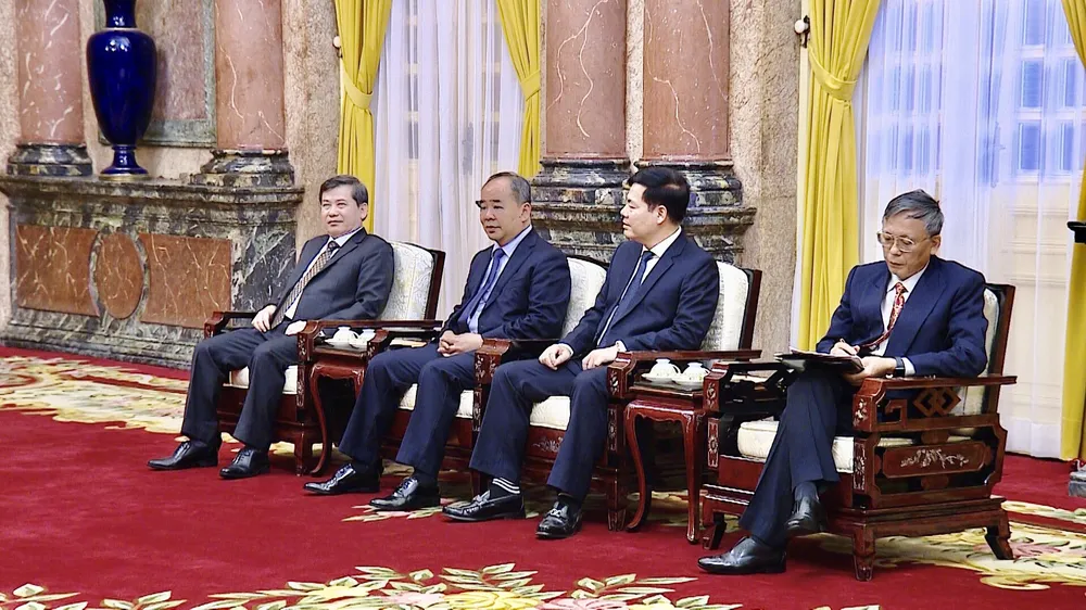 Chủ tịch nước Nguyễn Xuân Phúc tiếp Viện trưởng Viện Kiểm sát nhân dân tối cao Lào Xayxana Khotphouthone ảnh 5