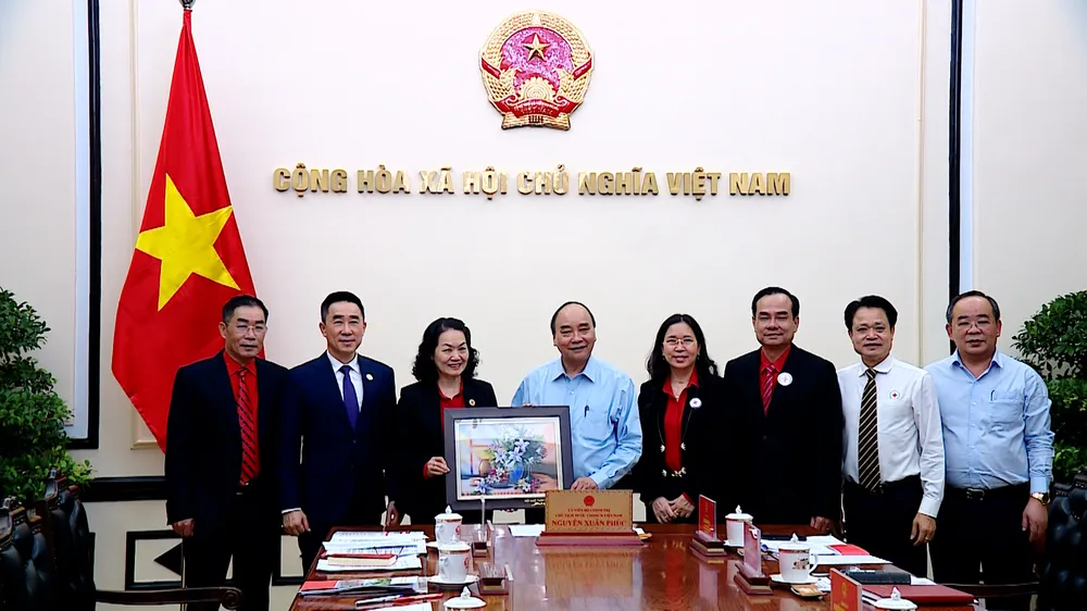 Chủ tịch nước Nguyễn Xuân Phúc: Huy động nguồn lực xã hội chăm lo Tết cho người khó khăn ảnh 3