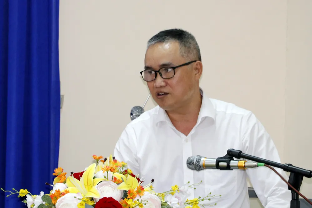 Phó Giám đốc Ngân hàng Nhà nước chi nhánh TPHCM Nguyễn Đức Lệnh thông tin tại hội thảo