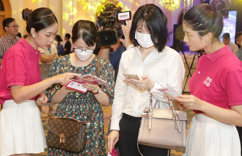 MoMo tổ chức chương trình “Không dùng tiền mặt 2022” tại Hà Nội ảnh 1