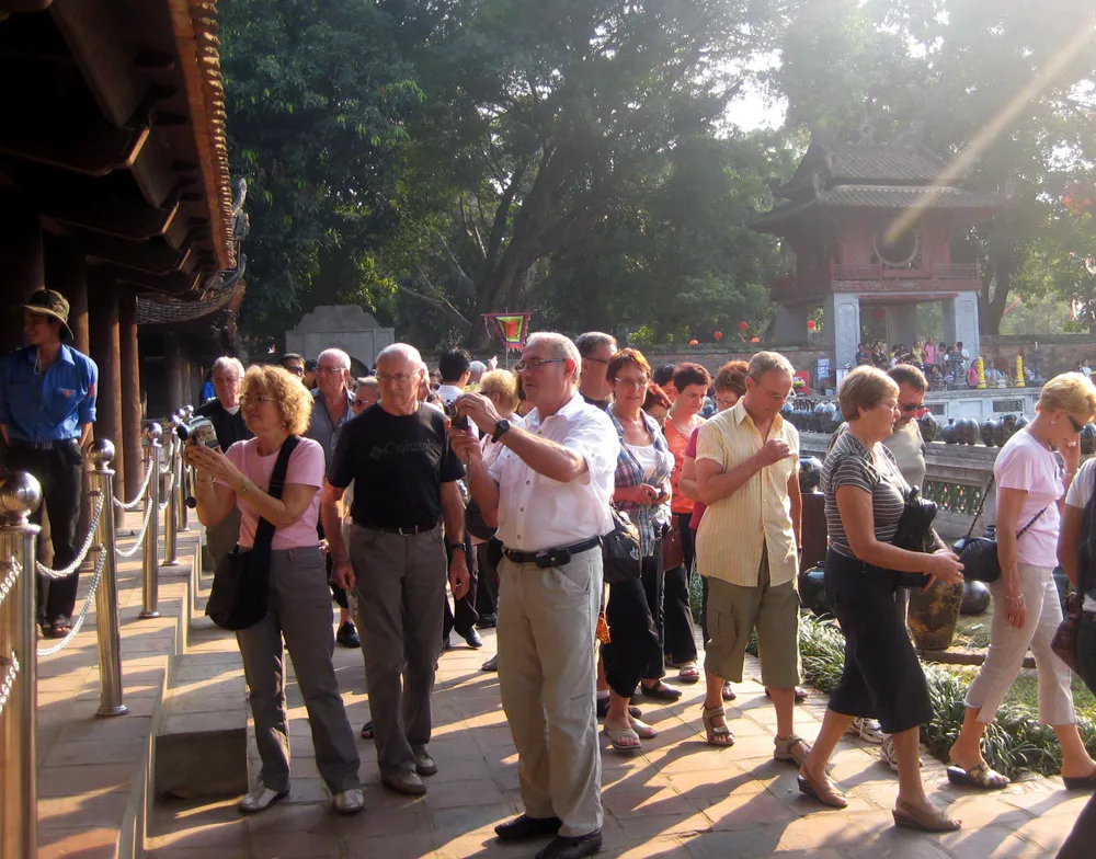 8 tháng, khách quốc tế đến Việt Nam đã đạt 11,3 triệu lượt ảnh 1