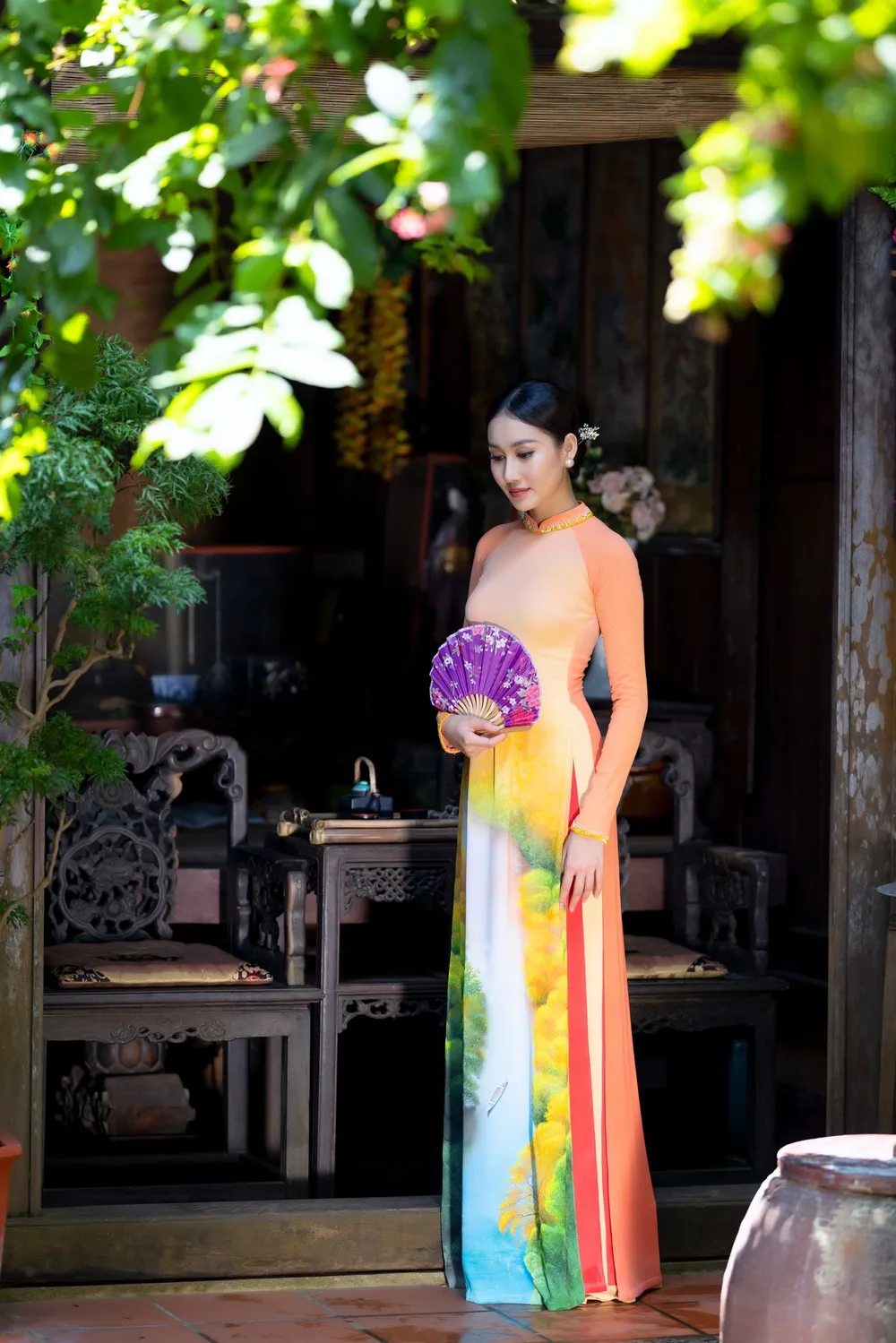 Đoàn Hồng Trang mang áo dài lụa vẽ Hội An đến Miss Global 2022 ảnh 3