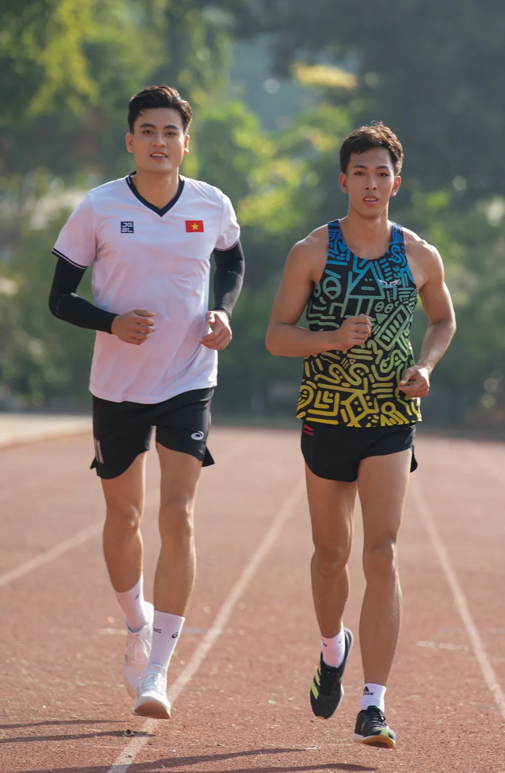 Trần Lê Quốc Đạt - Kiện tướng điền kinh, Nguyễn Phúc Lộc - Kiện tướng bóng chuyền .jpg