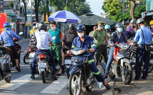 軍隊首天協助本市加強嚴管社交隔離 ảnh 4