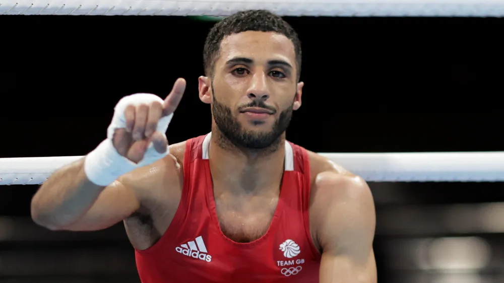 Chuyện chàng công nhân sắp trở thành võ sĩ vô địch Olympic ảnh 1