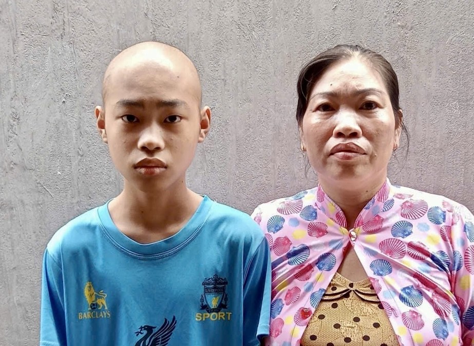 吴金枝和病儿黄晋福。