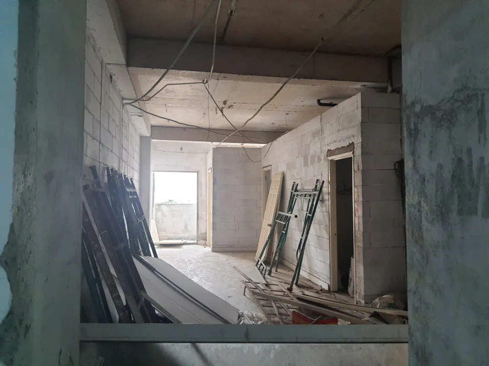 Cận cảnh chung cư xây dựng 10 năm chưa xong đã cho dân vào ở ảnh 3