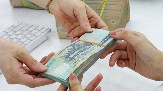 Zero percent loan rate provided for enterprises to pay wages for workers ảnh 1