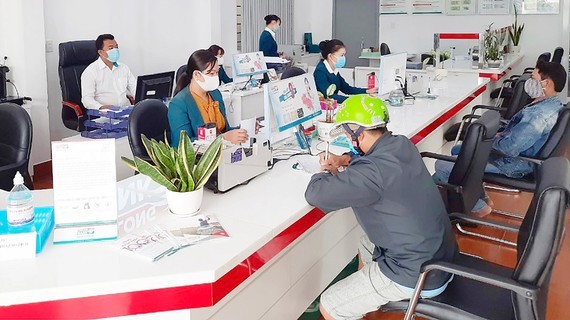 Banks improve credit growth in last months of 2021 ảnh 1