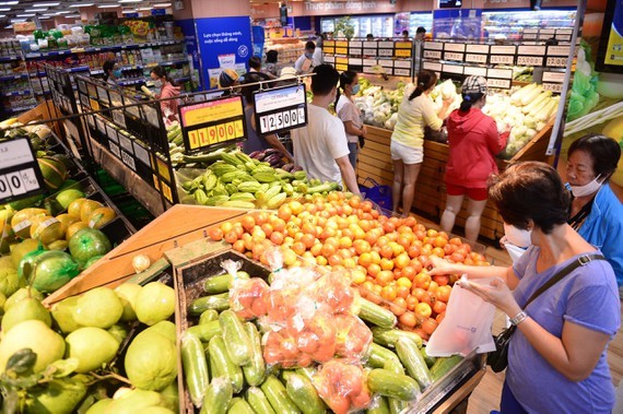 Weak purchasing power urges supermarkets to simultaneously run promotions ảnh 1