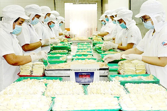 Enterprises speed up preparation of Tet goods ảnh 2