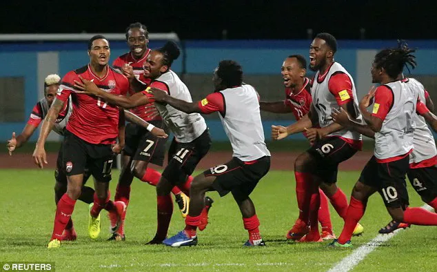 Các cầu thủ Trinidad and Tobago trong trận thắng 2 - 1 trước tuyển Mỹ. Ảnh: REUTERS