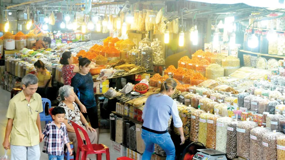 Giá sạp chợ An Đông: Tiểu thương được lợi gì khi ký hợp đồng mới? ảnh 1