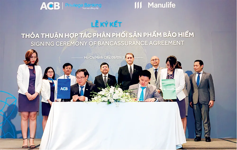 Manulife bán bảo hiểm qua ngân hàng ACB  ảnh 1
