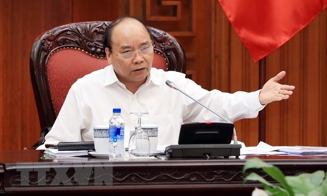 Prime Minister Nguyen Xuan Phuc addresses the meeting (Photo: VNA)