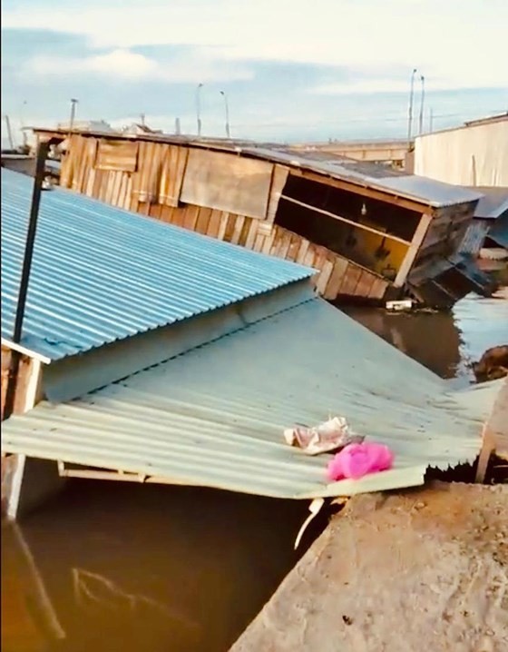 Houses collapse after landslide.