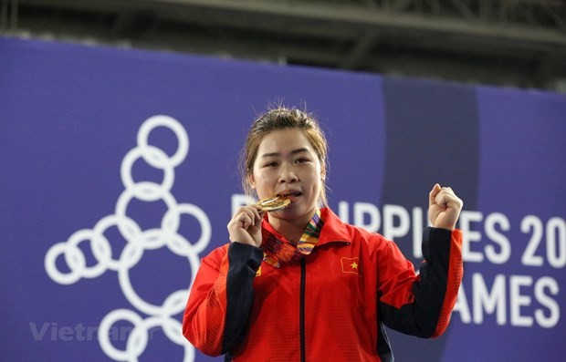 SEA Games 30: Wushu artist brings first gold for Vietnam in 3rd competition day ảnh 1