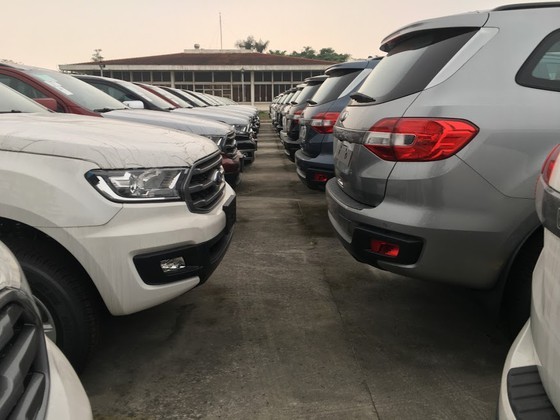 Imported cars  gather in parking lots in Sai Dong Ward in Hanoi's Long Bien District