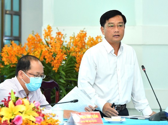 State President holds working session with Cu Chi, Hoc Mon districts in HCMC ảnh 5