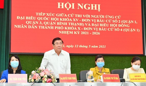 HCMC chairman, candidates for upcoming elections meet voters in District 1 ảnh 1