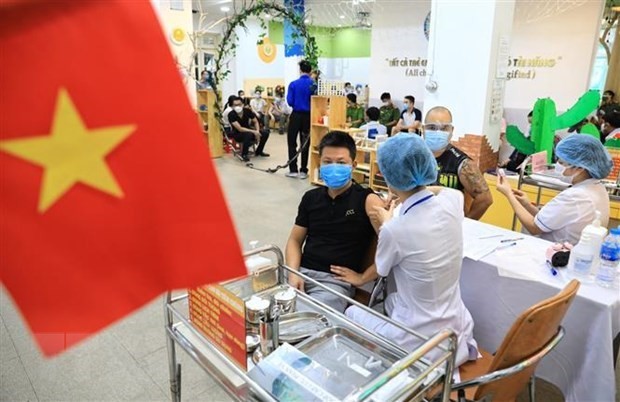 Germany’s newspapers spotlights Hanoi’s mass Covid-19 vaccination ảnh 1