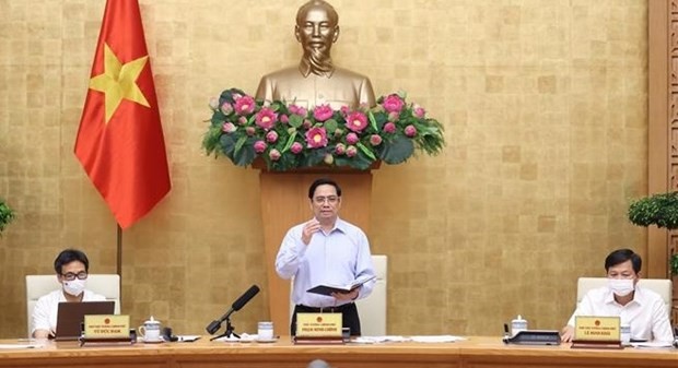 New approach, solutions needed in Covid-19 fight: PM ảnh 1