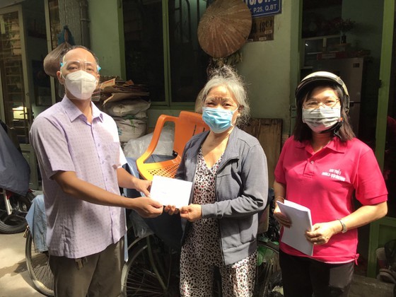 HCMC to finish disbursement of 2nd pandemic support package before August 10 ảnh 1