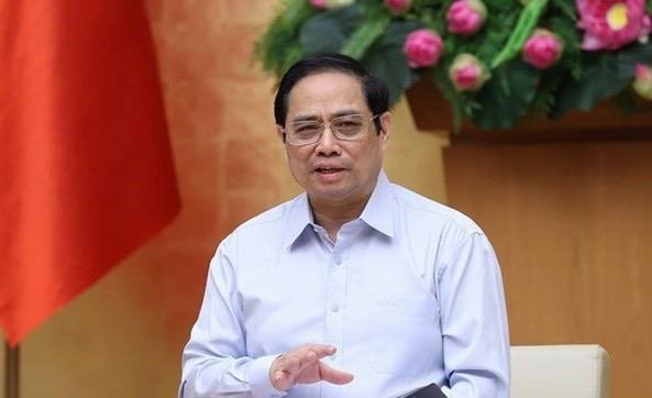 PM launches emulation movement for concerted efforts in Covid-19 combat ảnh 1
