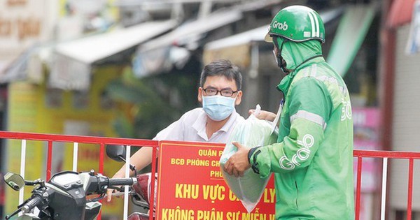 Shippers, employees of supermarkets proposed to operate until 9 pm ảnh 1