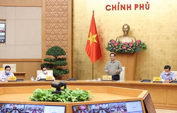 PM asks for safely adapting to pandemic ảnh 1
