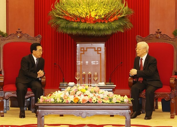 Party General Secretary receives Lao Prime Minister ảnh 1