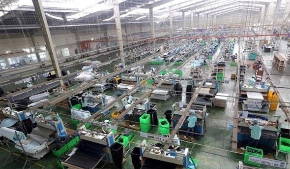 HCMC’s IIP edges down 14.3 percent last year ảnh 1