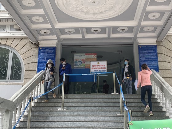 HCMC temporarily suspends issuing common passports ảnh 5