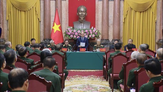 President meets war veterans of Vi Xuyen Front ảnh 2