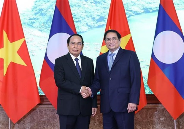 PM: bringing Vietnam-Laos economic cooperation on par with political ties ảnh 1