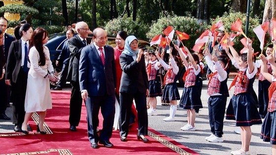 State President hosts welcome ceremony for Singapore's top leader ảnh 1