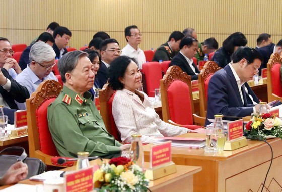 Politburo member and Permanent member of Party Central Committee's Secretariat Truong Thi Mai (2nd, R) and Minister of Public Security, General To Lam (L) attend the conference. (Photo: SGGP)