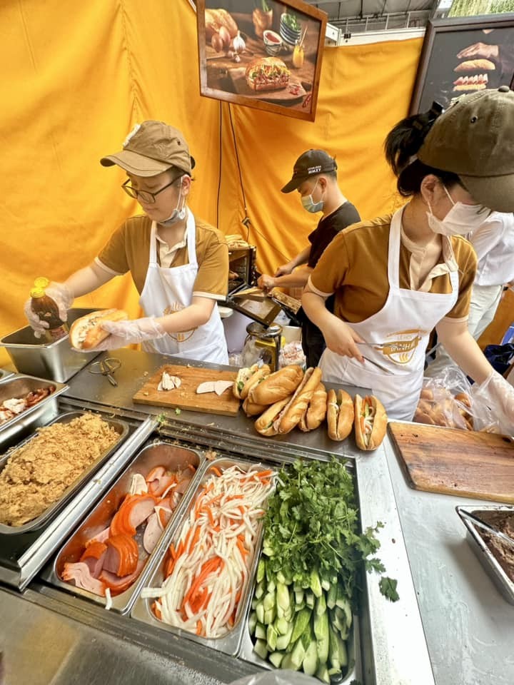 Banh mi, the most popular street food in Vietnam, is filled with a variety of ingredients, typically including meat, pickled vegetables, and chili. (Photo: KK)