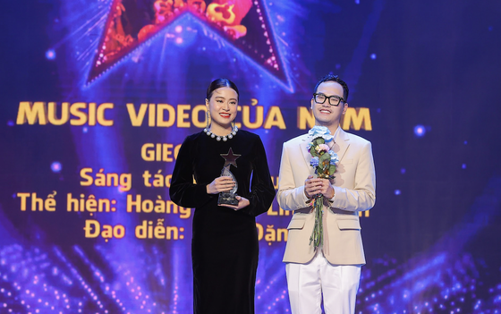 Singer Hoang Thuy Linh and musician Khac Hung