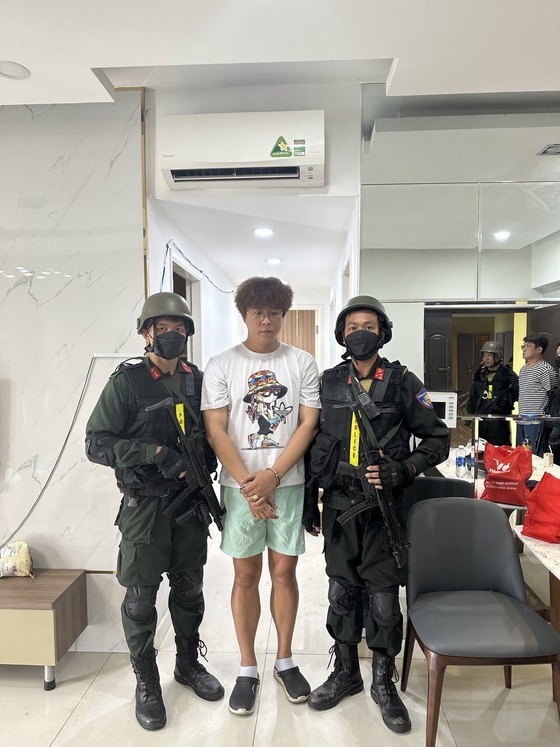 Three South Korean nationals wanted by Interpol for allegedly running illegal online gambling operations are arrested by authorities in HCMC. (Photo: SGGP)