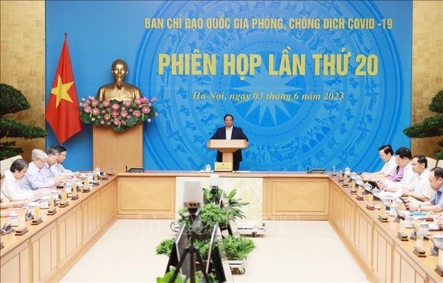 Prime Minister Pham Minh Chinh speaks at the meeting. (Photo: VNA)