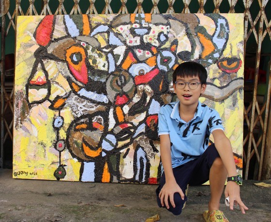 11-year-old artist Hoang Nhat Quang (Photo: SGGP)
