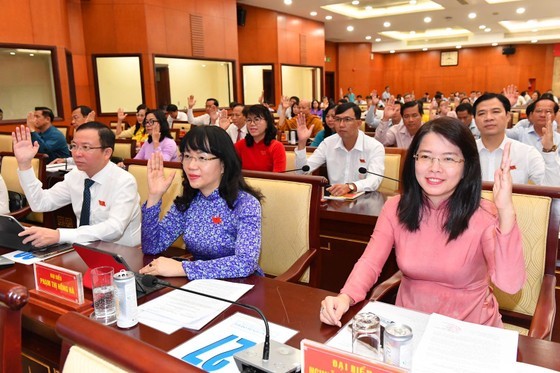 Delegates attend the 10th session of the 10th tenure People's Council of HCMC. (Photo: SGGP)