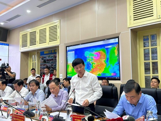 A representative of the standing office of the National Steering Committee for Natural Disaster Prevention and Control speaks at the conference. (Photo: SGGP)