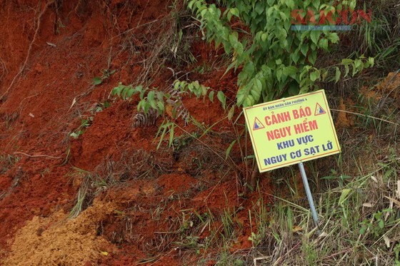 A landslide warning sign on An Binh Street A landslide warning sign on An Binh Street