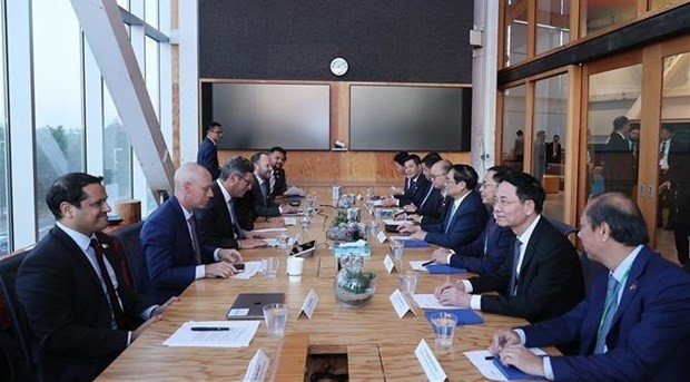 The meeting between PM Pham Minh Chinh and Joel Kaplan, Vice President for Global Public Policy at Meta, on September 18. (Photo: VNA)