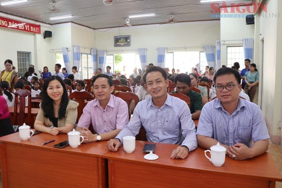Delegates attend the handover ceremony (Photo: SGGP)