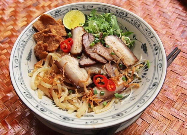 Cao Lau, a Vietnamese dish made with noodles, pork, and greens, is a specialty of Hoi An. (Photo: tuoitre.vn)