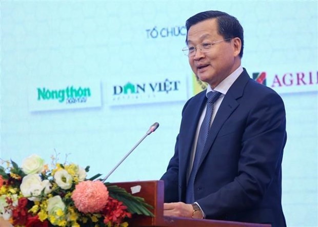 Deputy Prime Minister Le Minh Khai addresses the forum. (Photo: VNA)
