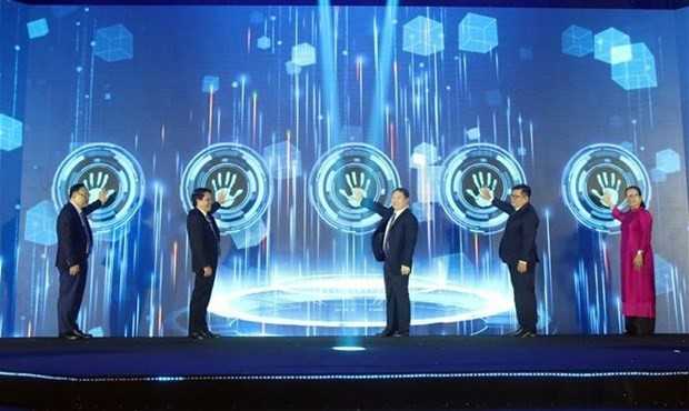 Representatives from agencies launch Ho Chi Minh City's digital platforms. (Photo: VNA)